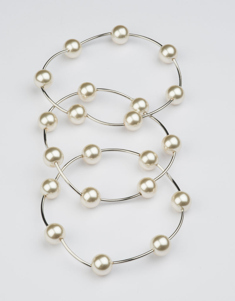 Bracciale elastico multi filo in perle e metallo